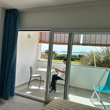 Rooms, Maksim * Golfo Aranci